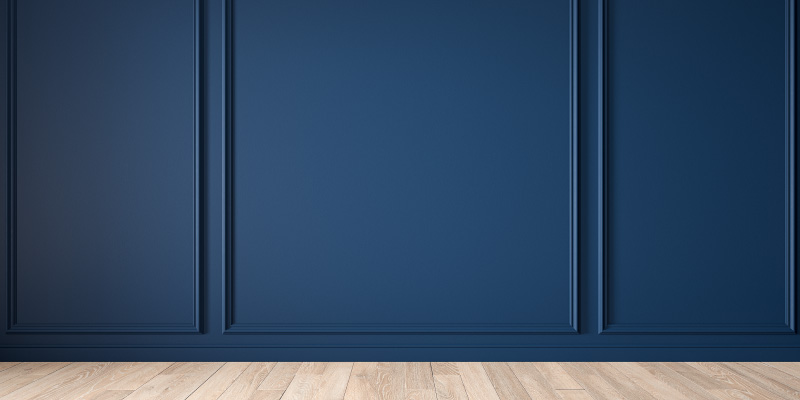 dark blue accent wall with wainscoting