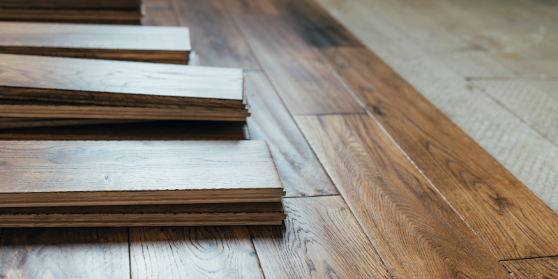 new wood flooring planks being installed