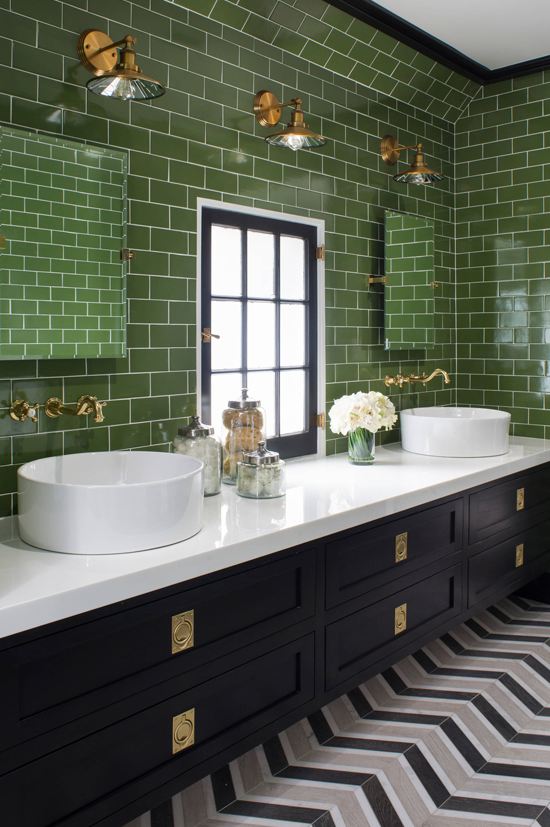 green tile wall with white and black tile bathroom floor