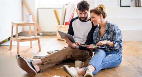 couple looking at laptop during project