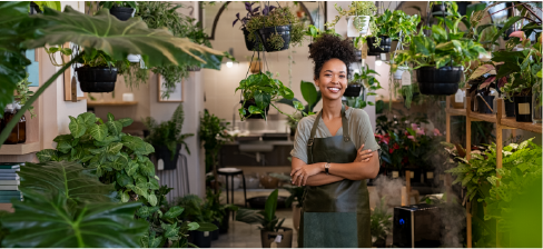 woman standing in retail plant store