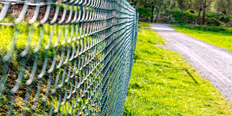 chain link fence along private drive
