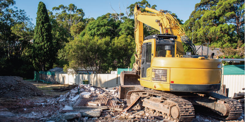 excavator at demolition site