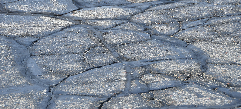 cracks in asphalt parking lot