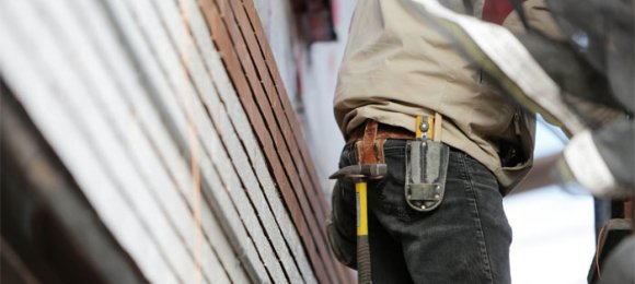 contractor wearing a utility belt