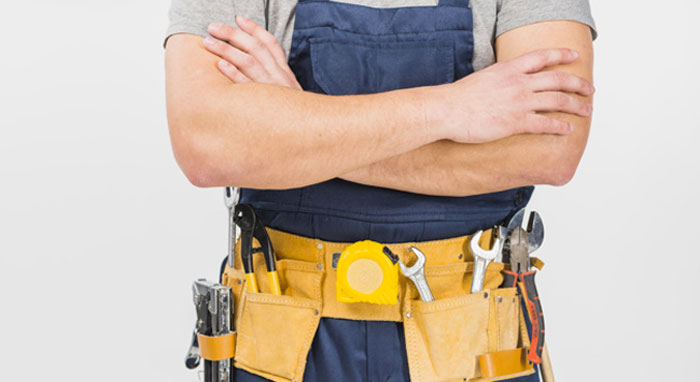 crossed arms of a contractor